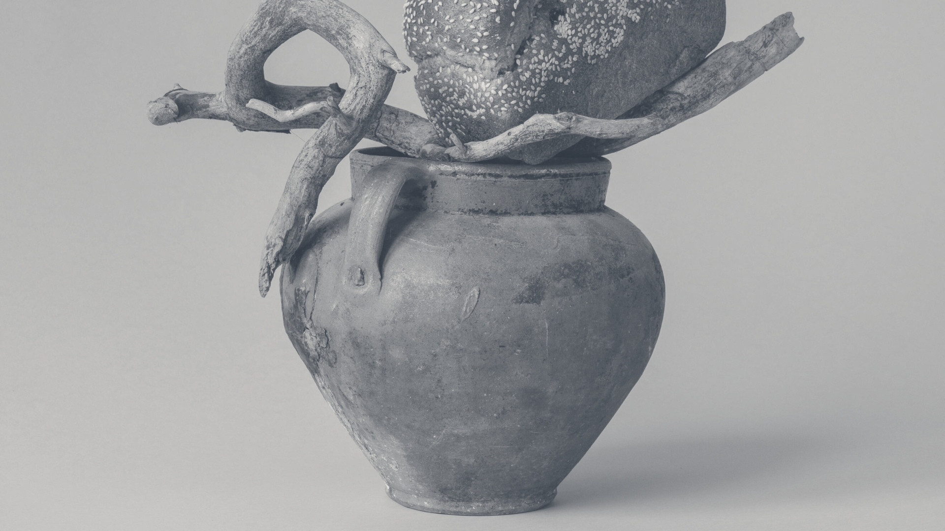 Handcrafted clay jar symbolizing biblical vessels and spiritual growth, representing the fragility and strength of faith.